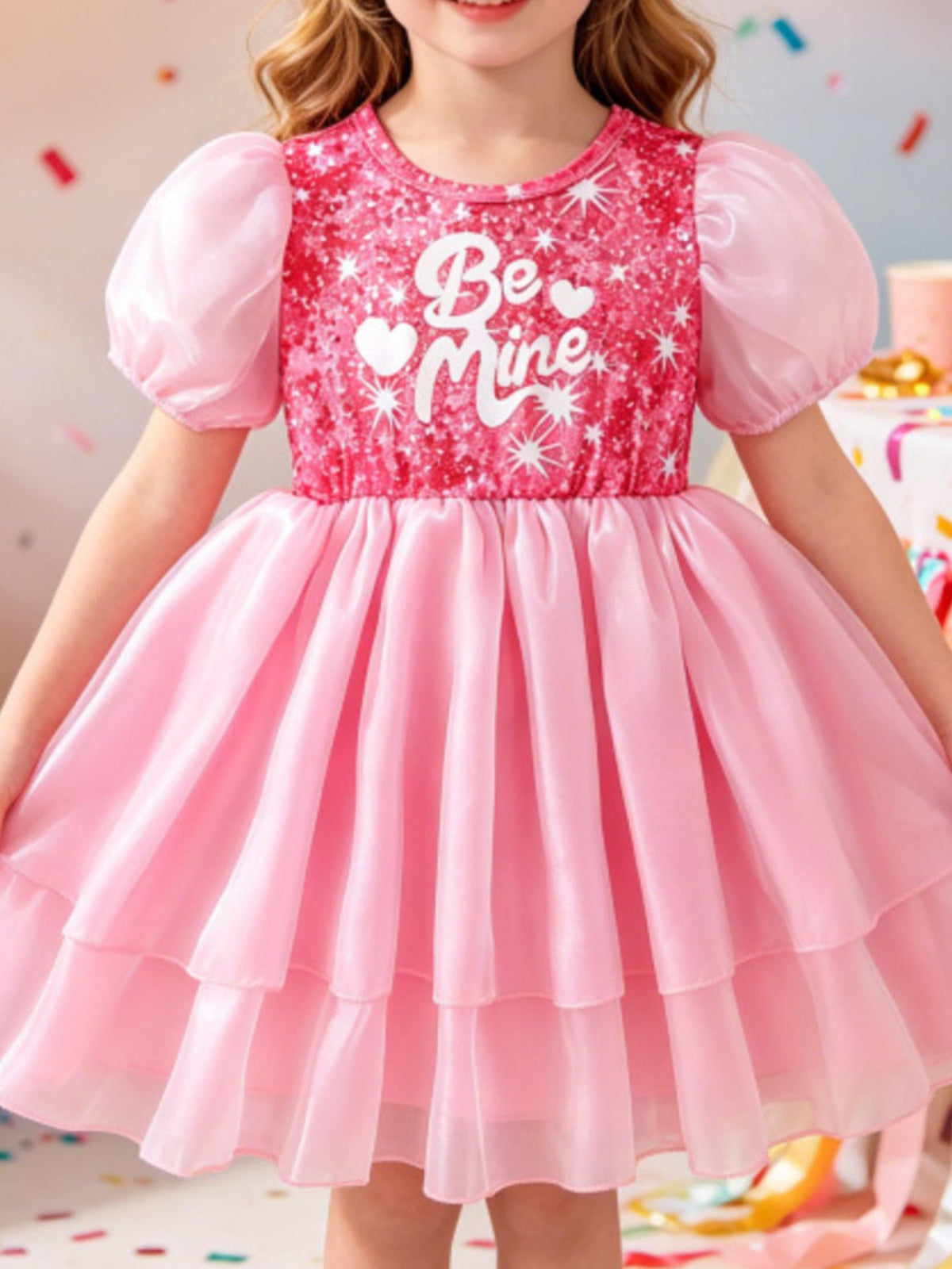Pink sequin baby dress with puff sleeves and "Be Mine" graphic, tiered skirt