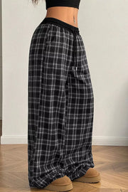 white wide-leg pants featuring drawstring waist and plaid