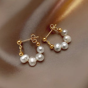 earrings in ivory featuring freshwater pearls and hoop fit
