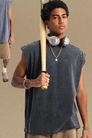 Dark gray raw edge muscle tank top with a washed finish.