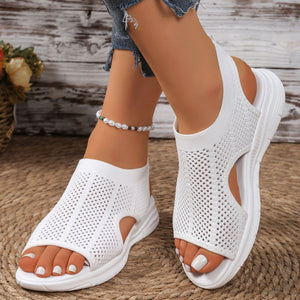 Modern mesh open-toe sandals in white with a chunky sole and breathable knit.