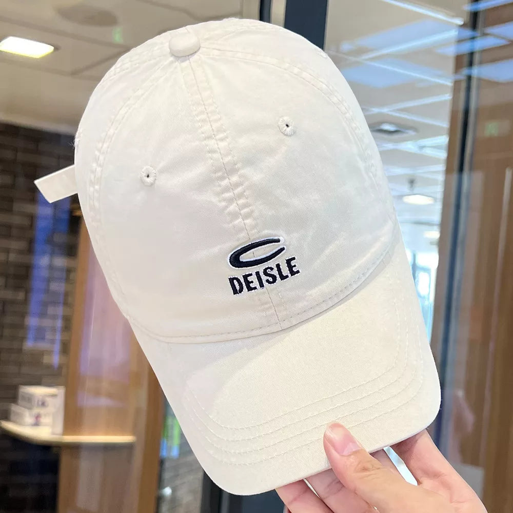 White baseball cap with black embroidered logo