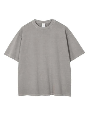 Oversized washed cotton tee in light gray with a relaxed fit and crew neck.