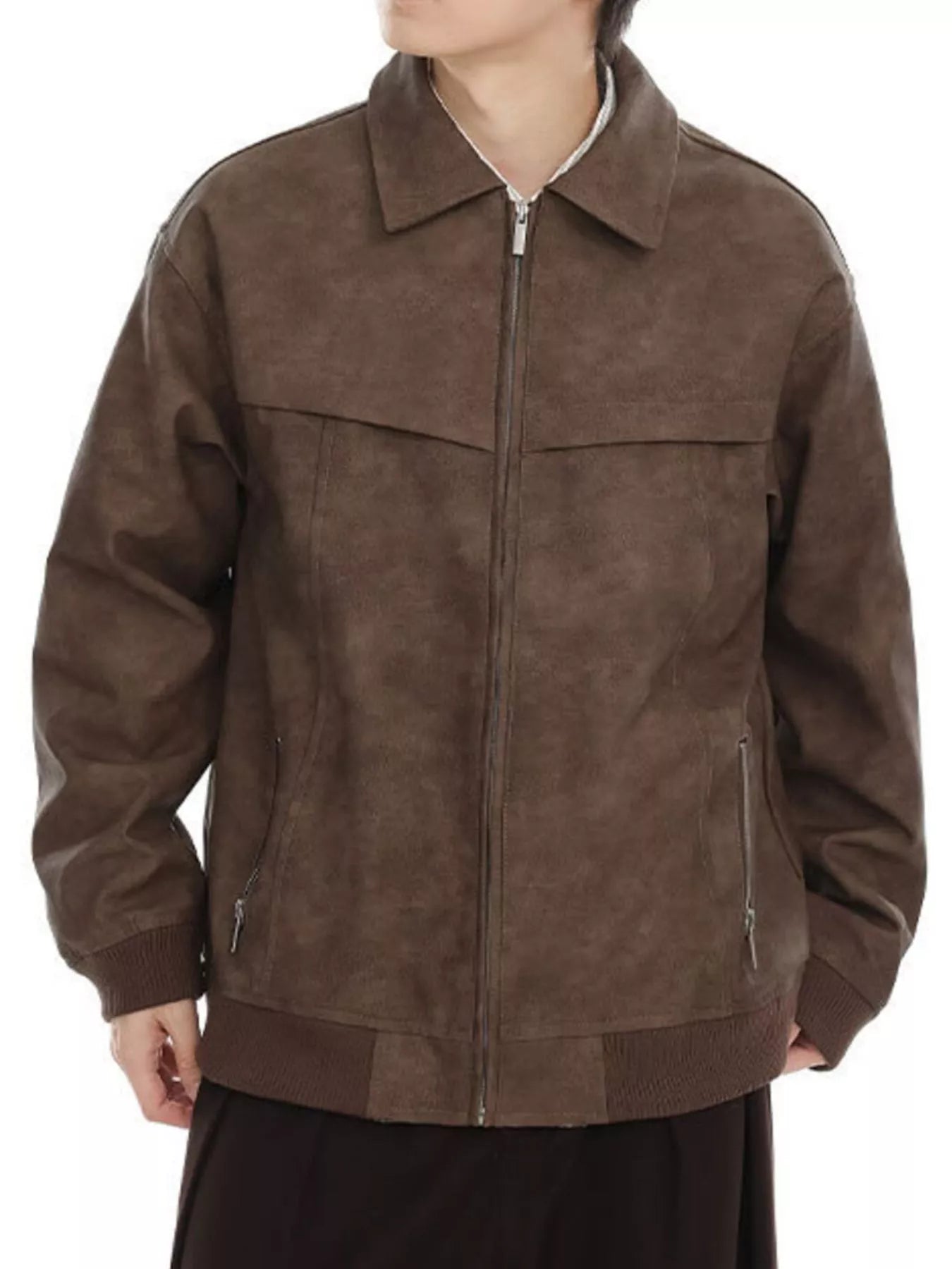 Brown bomber jacket with drop shoulders, zip front, and ribbed cuffs and hem.