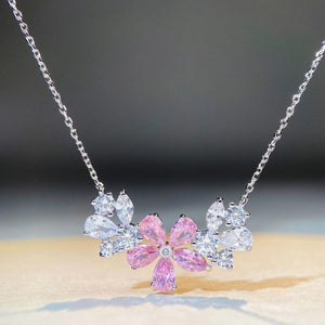 silver necklace featuring zircon embellishment and floral