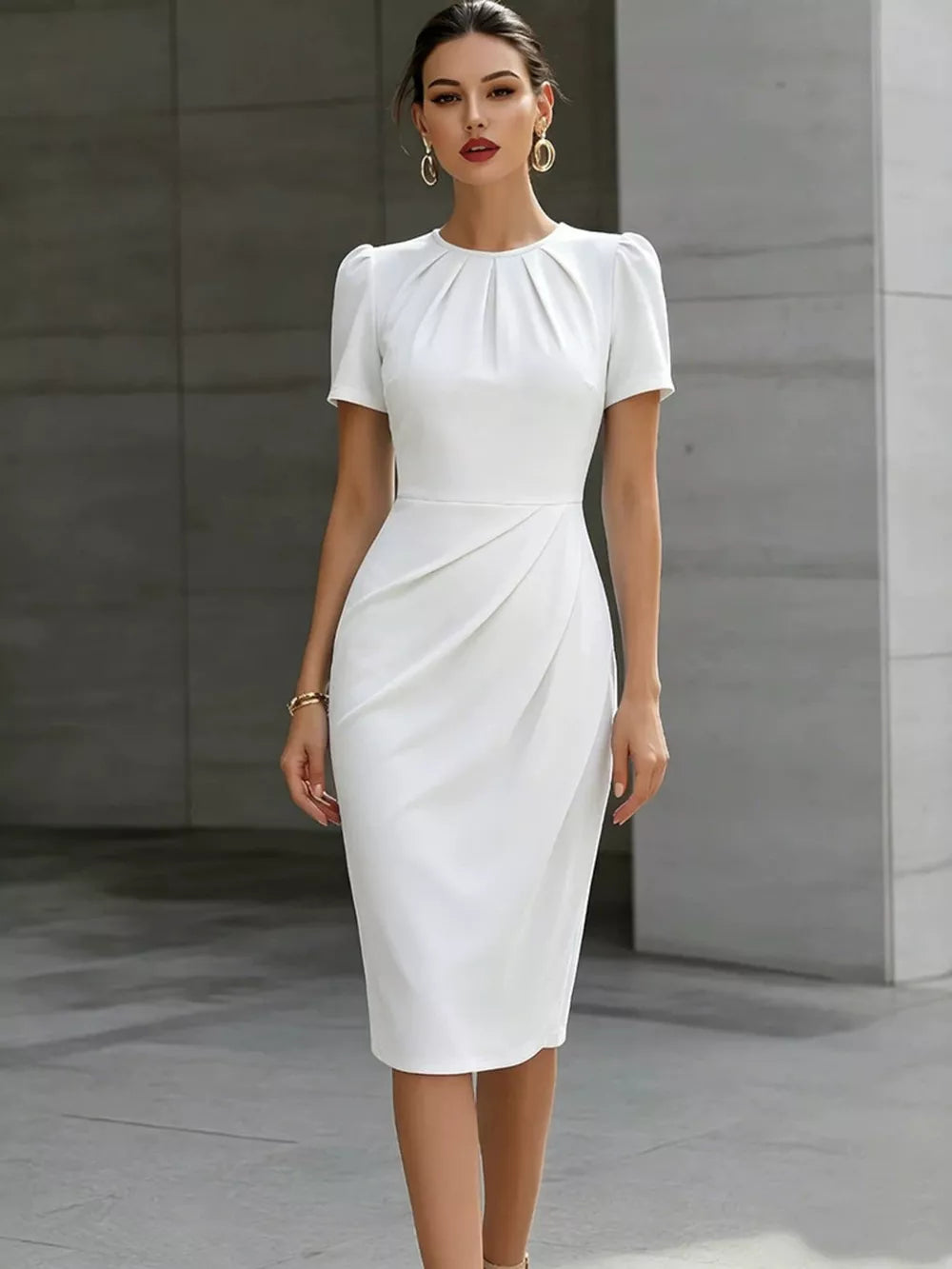 White midi dress with ruched waist, pleated neckline, and short puff sleeves.