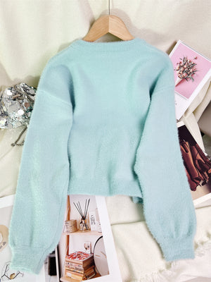 Green relaxed cardigan with round neck