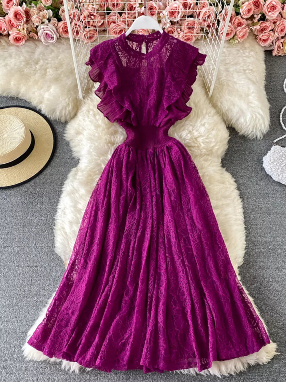Fuchsia lace maxi dress with ruffled sleeves and cutout waist