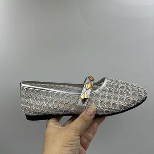 silver flats featuring round toe and geometric