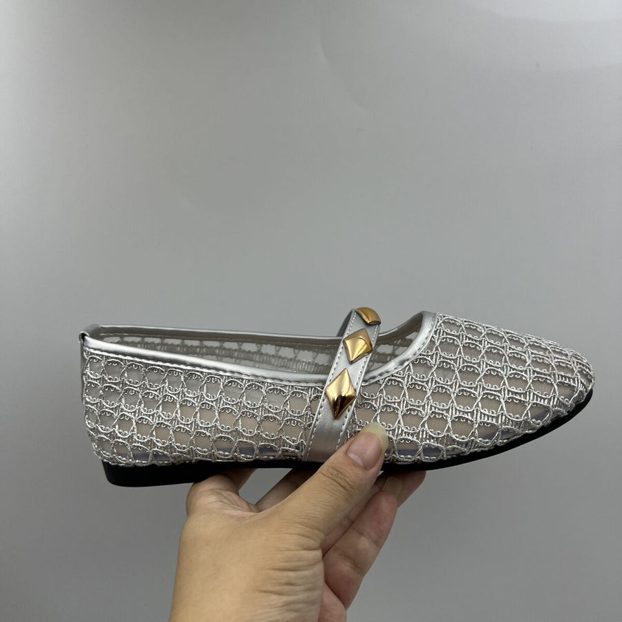 silver flats featuring round toe and geometric