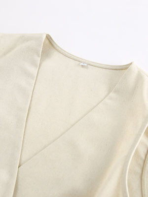 Cream cotton buttoned vest with V-neckline detail