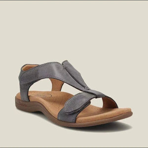 Gray leather T-strap comfort sandals with adjustable straps and cushioned footbed.