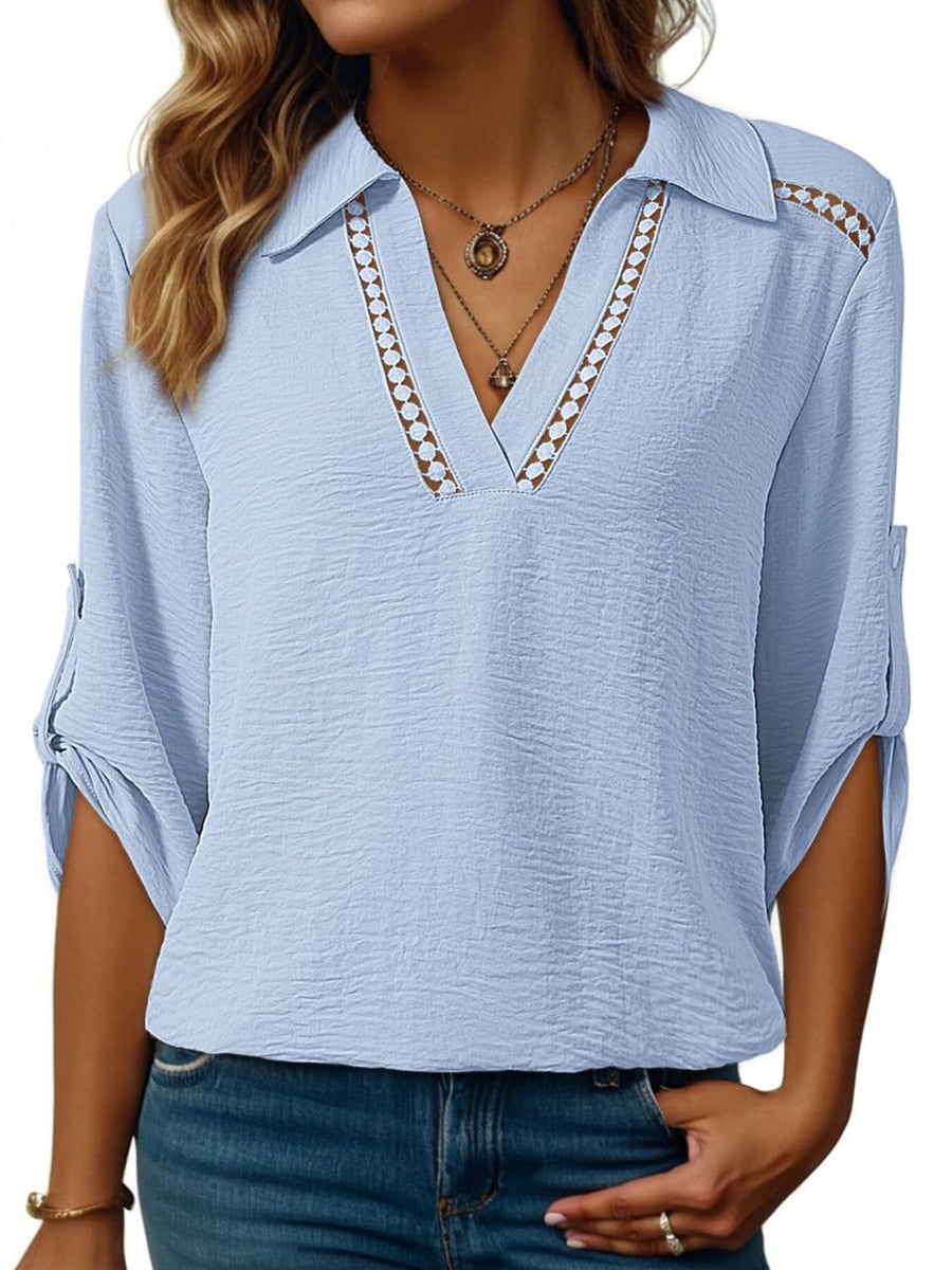 Sky blue crinkled texture shirt with Johnny collar, V-neck, and roll-tab sleeves.