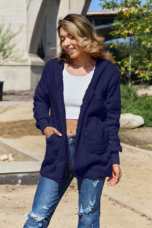 Plush hooded cardigan jacket in dark blue with pockets.