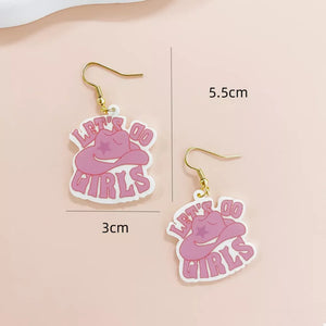 earrings in hot pink with graphic print and dangle