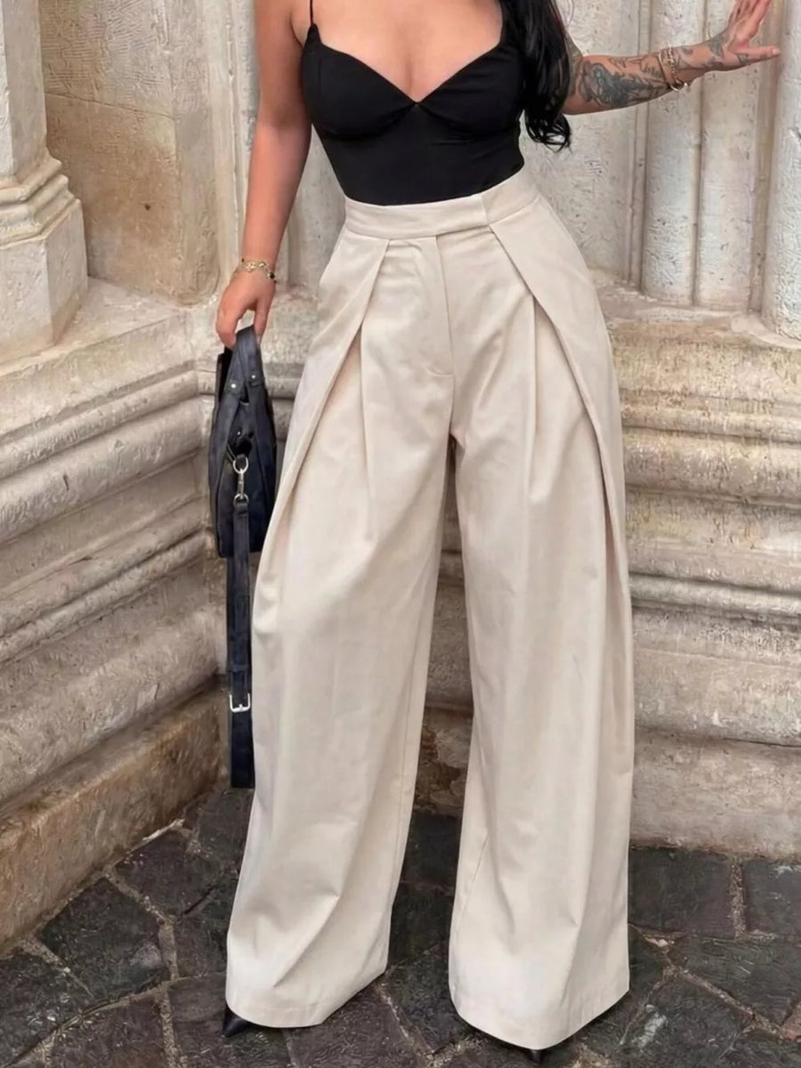 Elegant high-waisted wide-leg cream trousers with front pleats.