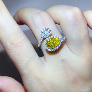 925 sterling silver,Moissanite Carat weight: 2ct Care instructions: Avoid wearin ring in yellow with bypass silhouette
