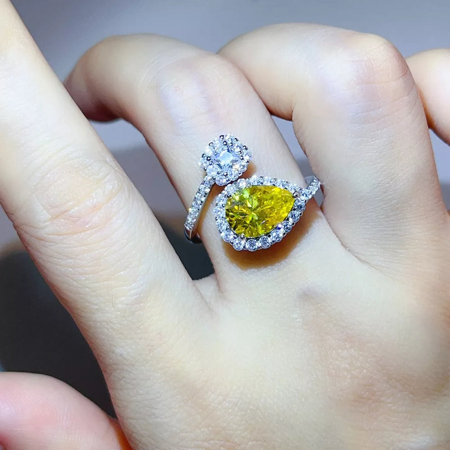 925 sterling silver,Moissanite Carat weight: 2ct Care instructions: Avoid wearin ring in yellow with bypass silhouette