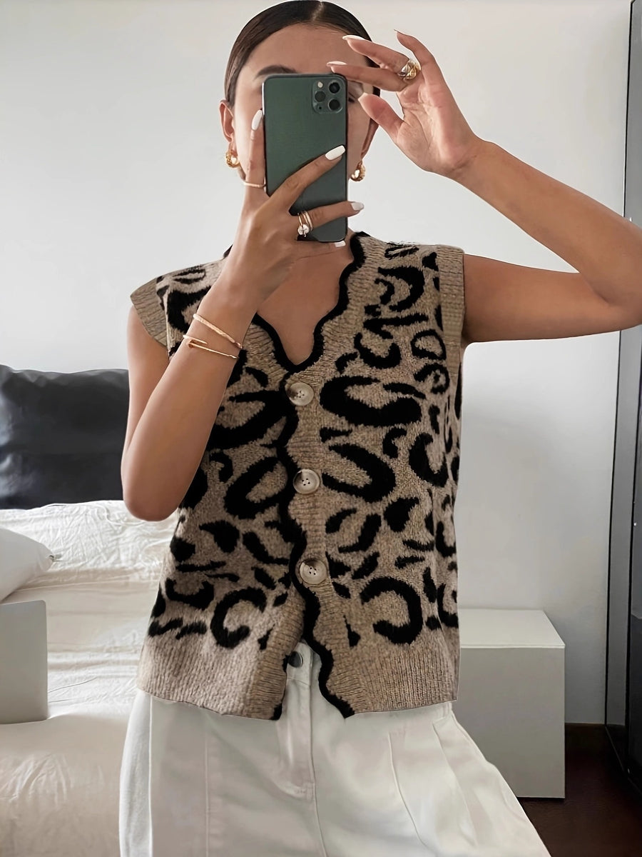 black sweater vest featuring buttoned and leopard