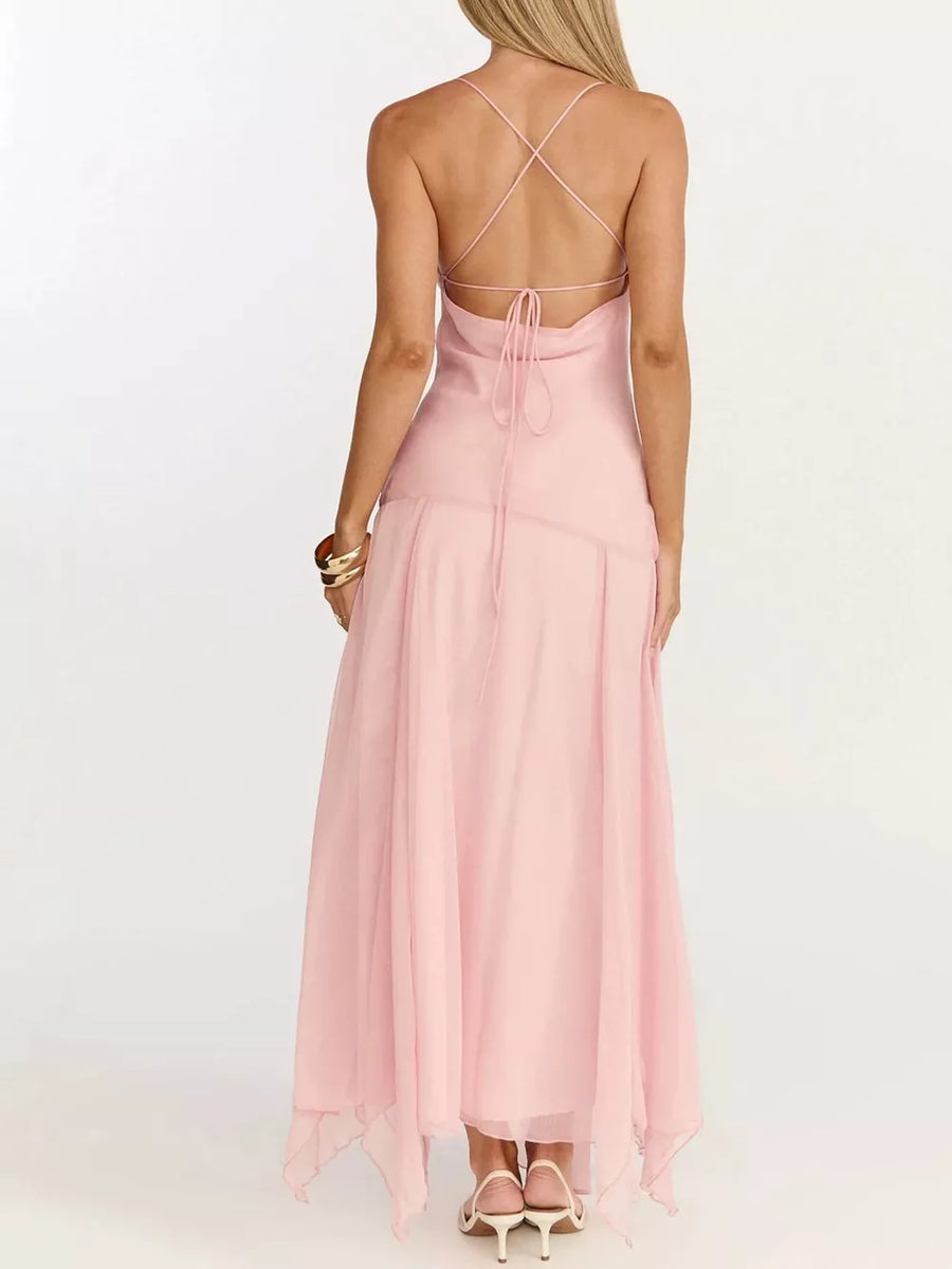 Pink maxi dress with spaghetti straps and a lace-up back detail.