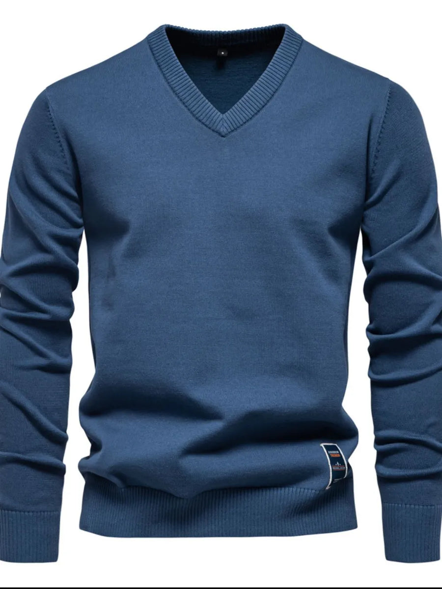 Peacock Blue V-neck ribbed knit sweater with long sleeves and a small logo tag.