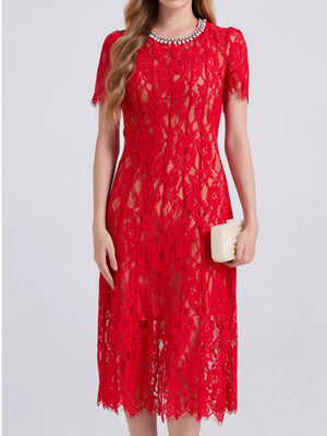 Red lace midi dress with pearl neckline and short sleeves.