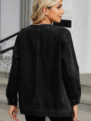 Black denim blazer with buttoned cuffs and a rounded neckline, shown from the back.