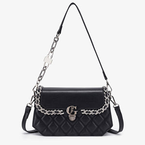 crossbody bag in black featuring quilted and structured fit