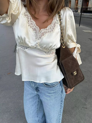Cream lace trim v-neck blouse with tie sleeve detail
