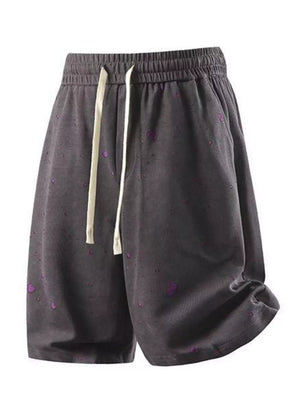 Men's relaxed fit cotton blend shorts in dark grey with purple speckle pattern and drawstring.