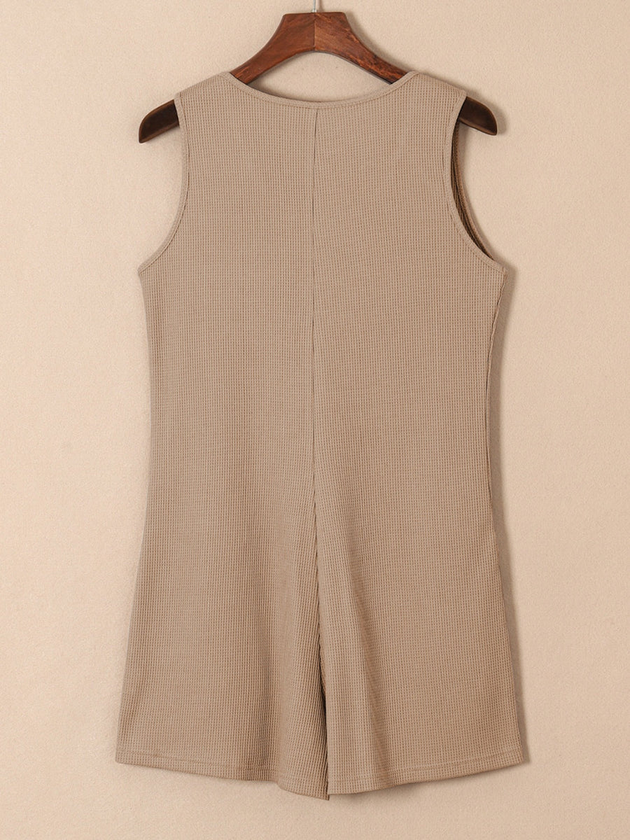 Camel waffle knit button-down romper with pockets, sleeveless, round neck