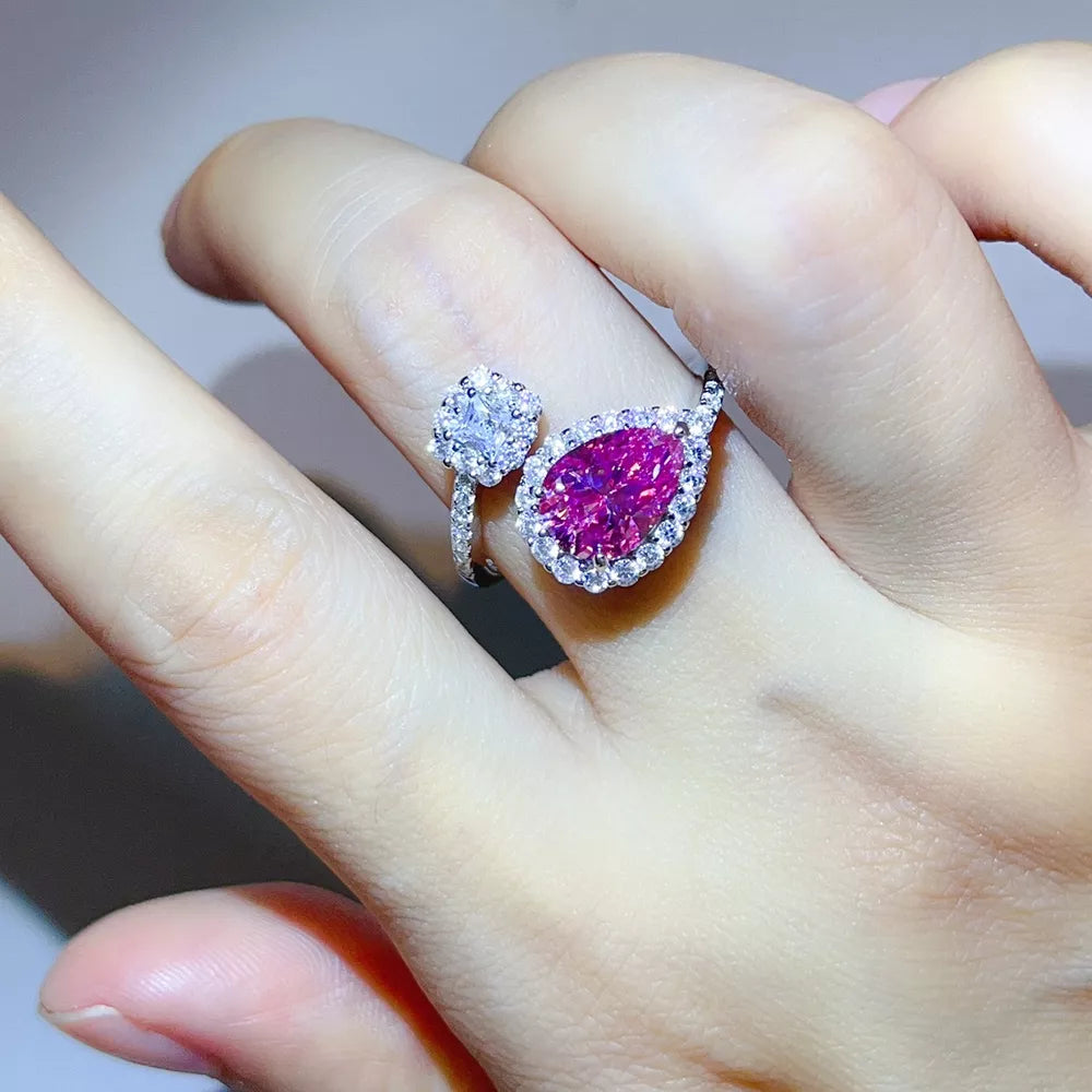 ring in silver featuring moissanite stones and bypass fit