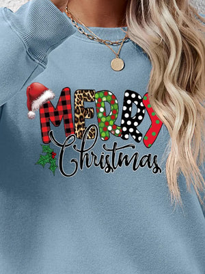 Misty Blue sweatshirt with festive Merry Christmas graphic, Santa hat, holly, plaid, leopard, polka dot, and red green