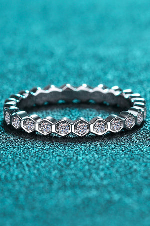 Silver eternity ring with hexagonal settings and clear stones