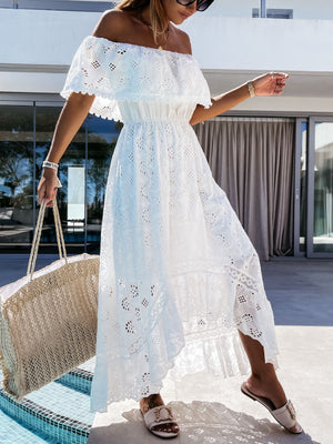 White eyelet lace off-shoulder maxi dress with ruffled trim and tiered skirt.