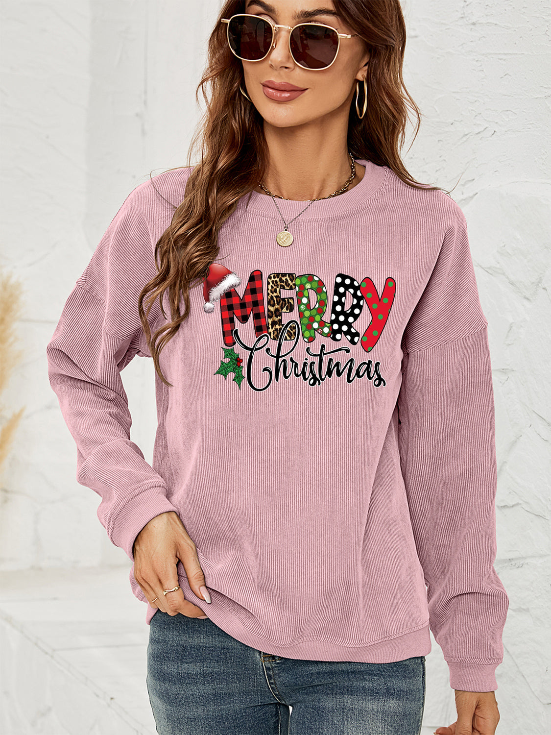 Dusty Pink corduroy sweatshirt with Merry Christmas graphic and festive details.