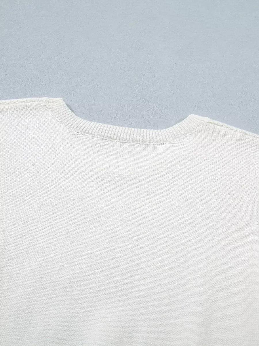 White acrylic sweater with crew neck and ribbed trim