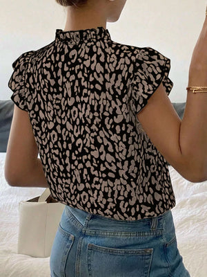 Black and tan leopard print mock neck top with flutter sleeves