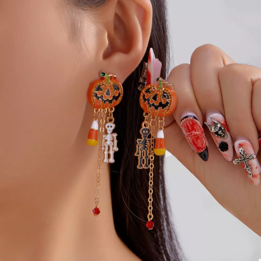 earrings featuring novelty in black with 18K Gold-Plated, Alloy, Resin, Copper, Rhinestone Care instructions: Avoid weari