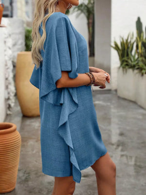 Blue V-neck mini dress with flowy sleeves and ruffled hem detail.