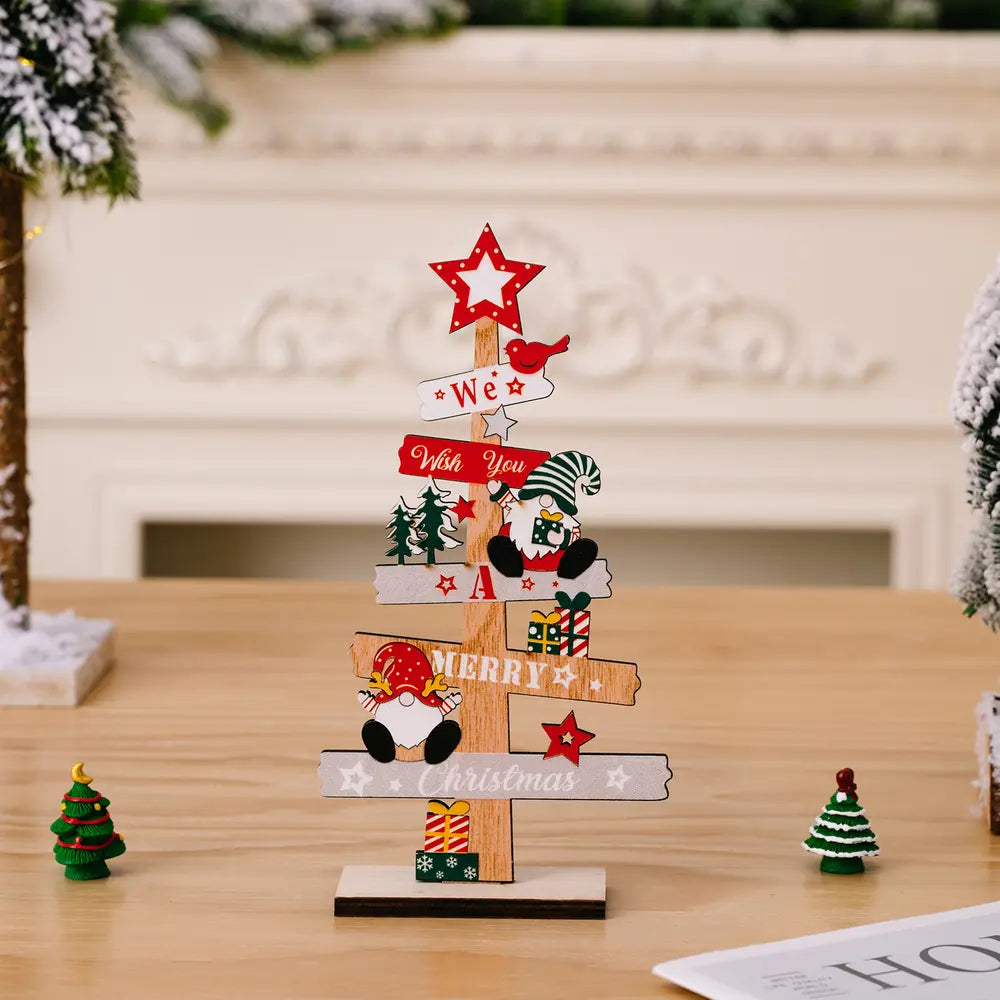 Holiday signpost decor with gnomes, trees, gifts and Merry Christmas text.