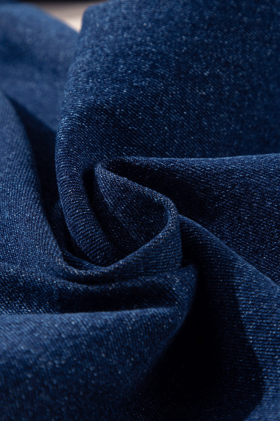 Mid-rise straight leg jeans in dark wash denim with a classic weave.