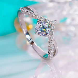 925 sterling silver,Moissanite Care instructions: Avoid wearing during exercise, ring in clear with V-shape silhouette