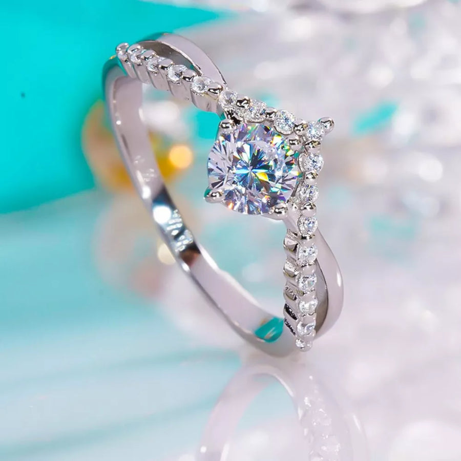 925 sterling silver,Moissanite Care instructions: Avoid wearing during exercise, ring in clear with V-shape silhouette