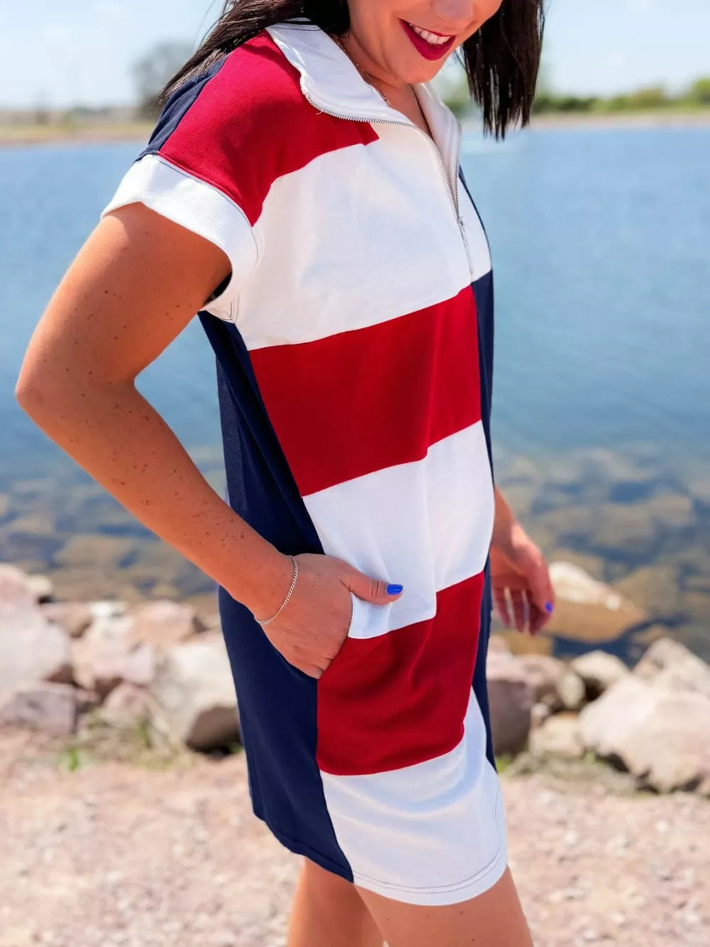 Americana colorblock mini dress with quarter zip, short sleeves, and pocket.