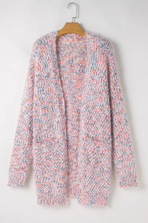 Multicolor bouclé knit cardigan with pockets and open front, featuring blush pink, grey, and white flecks.