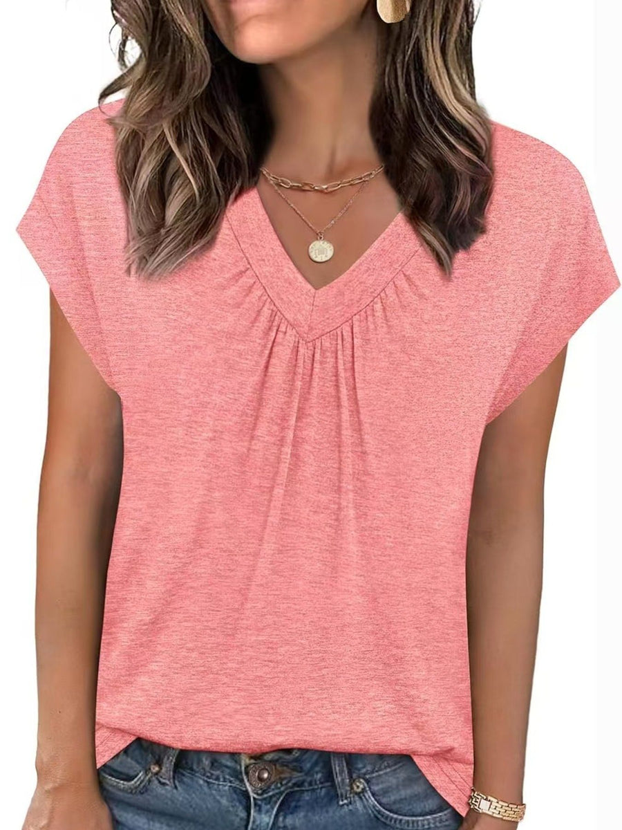 Pink ruched V-neck t-shirt with short sleeves and a relaxed fit.