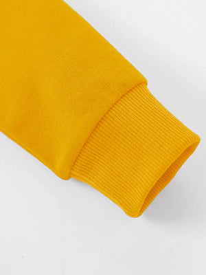 Mustard yellow baby sweatshirt sleeve with ribbed cuff detail