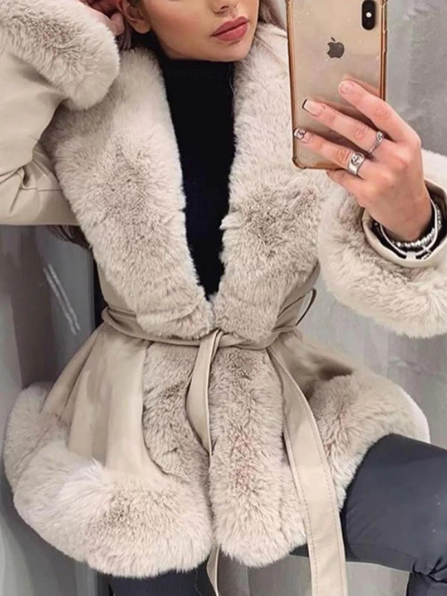Beige belted faux fur coat with textured details and a tie waist.