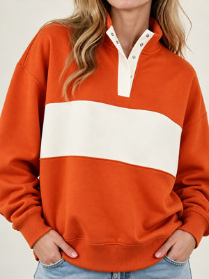 Black sweatshirt with half-button and color-block, abstract-print